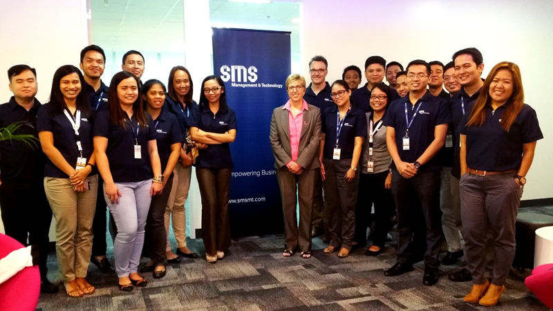 Jackie Korhonen, CEO of SMS Management & Technology with the SMS Philippines team. 